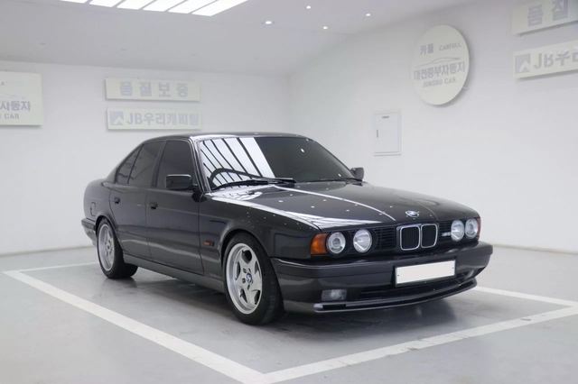 BMW M5 3.5 MT — фото 1